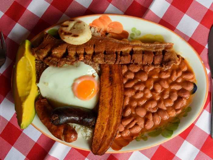 A very common meal in Colombia is a bandeja paisa (platter of the Paisa region) which consists of beans, plantains, avocado, eggs, and meat.