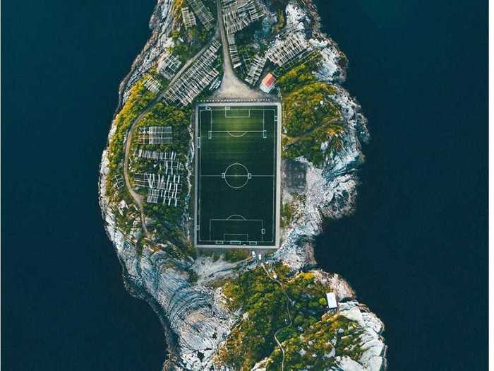 This aerial shot of Henningsvær, an island off the coast of Norway, highlights its soccer field.