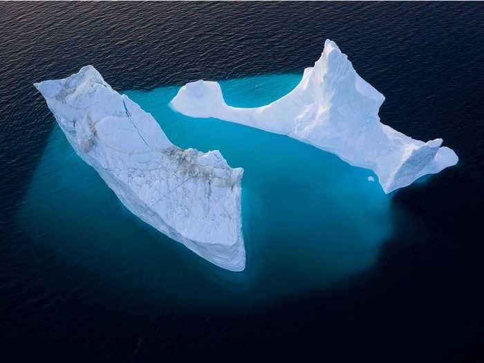 In other parts of the world, like Greenland, icebergs form in the water.