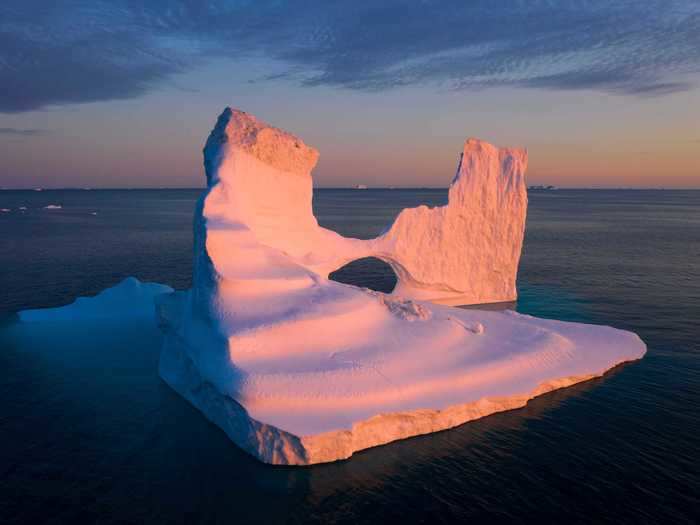 When sunlight hits the icebergs, it creates a dazzling display of colors.