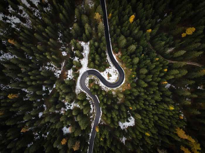 The roads twisting and turning through the Italian Alps are just as magical from the sky.