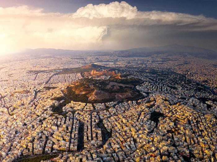 Aerial photography shows us just how vast some cities are, like Athens, Greece, in this case.