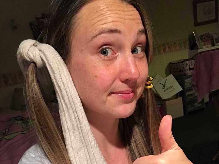 I decided to take a new approach and actually tie the sock in a knot around the top of the hair. This turned out to be the most challenging part of the whole process, and my sister had to do the first one for me.