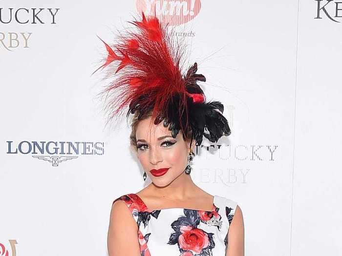 Kira Kazantsev, Miss America 2015, rocked a fascinator with cherry red plumage at the 141st Kentucky Derby.