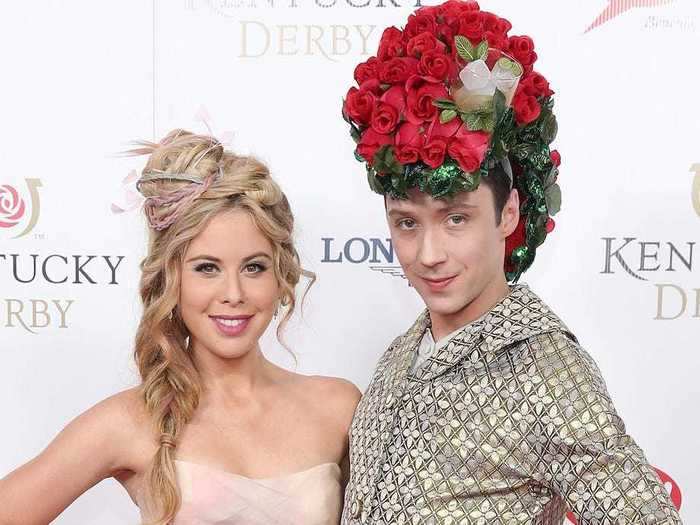 A cocktail was casually buried within the blanket of red roses covering Johnny Weir