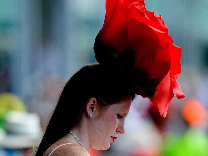 Roses are a popular hat embellishment from year to year, but one woman took the flower to the extreme in 2016.