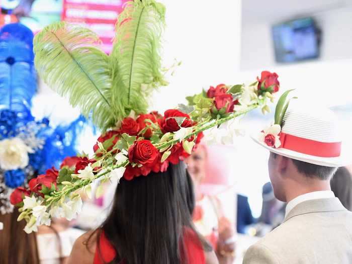 In 2017, this expansive rose headpiece balanced flat across a woman