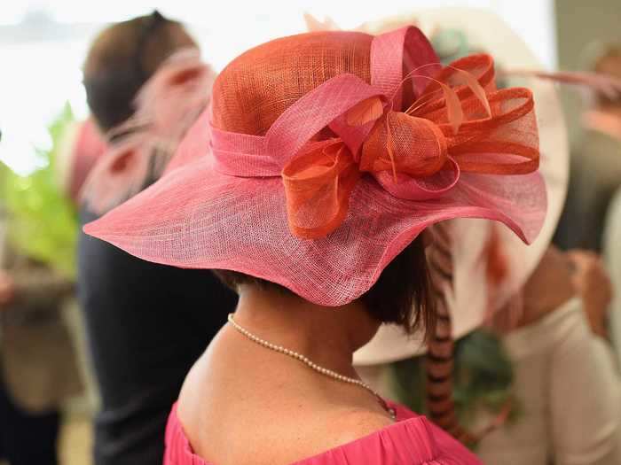 This attendee abandoned the pastels of spring for a vibrant pink and orange hat.