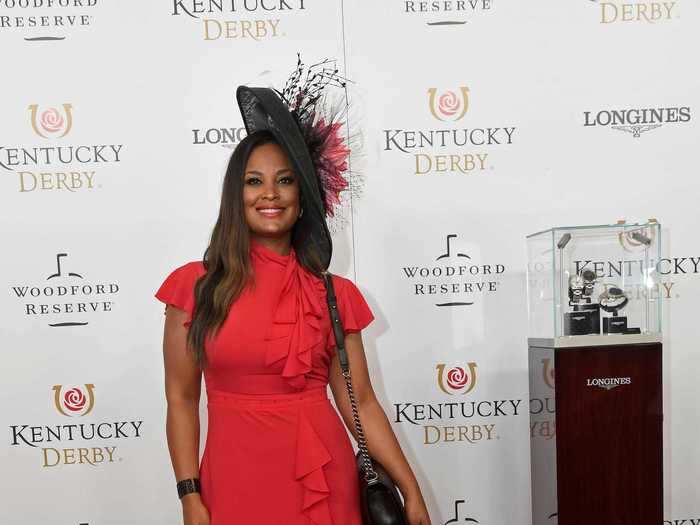 Laila Ali arrived in a bold-red ensemble in May 2018.