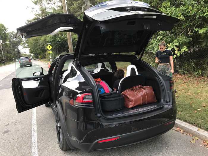 Open up all the doors and the Model X shows its true colors — this seven-passenger luxury SUV (with an optional third row) can swallow a huge amount of luggage and still have room for passengers to travel in comfort.