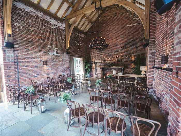 While many couples choose to hold their receptions and dinners inside barn venues, they can also make romantic ceremony spaces.