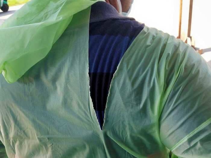 In India, the shortage of protective equipment is forcing doctors to turn instead to motorbike helmets and thin plastic raincoats, which can easily rip during a shift.