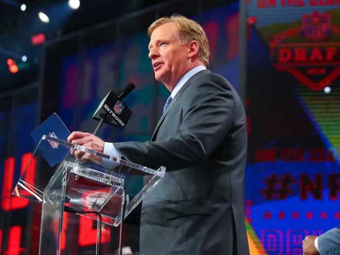 NFL commissioner Roger Goodell is used to announcing draft picks from behind a podium on stage.