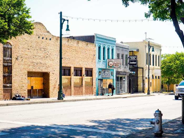 Sixth Street, which typically looks like a loose parade of partiers every weekend in the spring, looks like a ghost town during the pandemic.