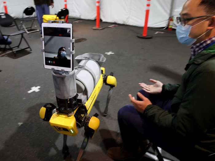 Using this setup, doctors can talk to patients and evaluate their symptoms from afar, without having to put themselves at risk of exposure.