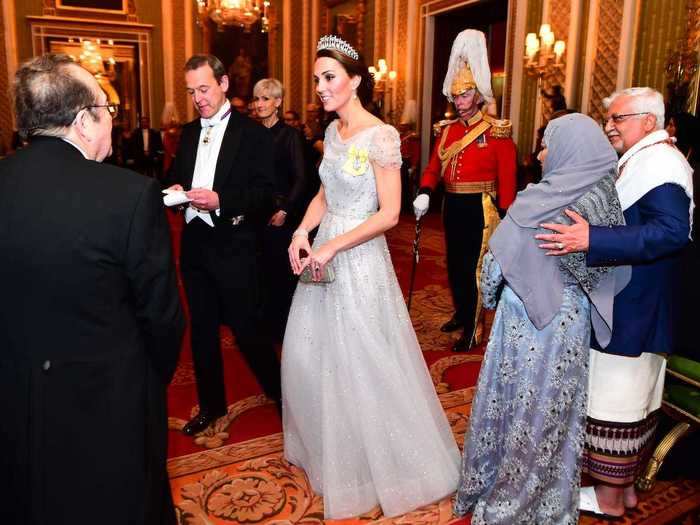 The duchess dazzled in a crystal-covered blue gown for the Queen