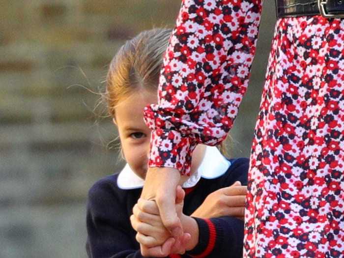 However, the royal also has a shy side. On her first day of school, she hid behind her mom.