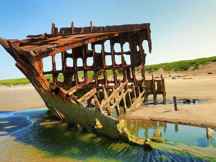 The wreck of the Peter Iredale, a steel barque sailing vessel that was beached more than 100 years ago, is in Oregon