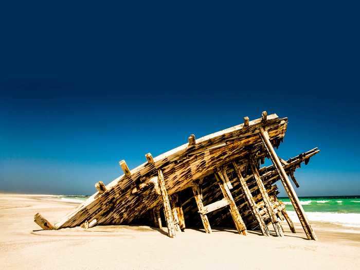 Referred to by locals as "The Lost Boat", this shipwreck lies on Masirah, an island in the Arabian sea off the coast of Oman.