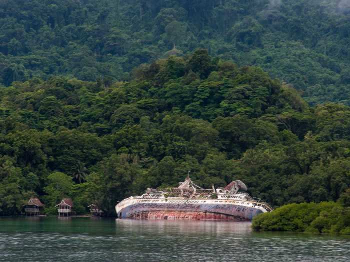 Once a large cruise ship, the World Discover hit an uncharted reef in 2000, and has remained shipwrecked in the Solomon Islands ever since.