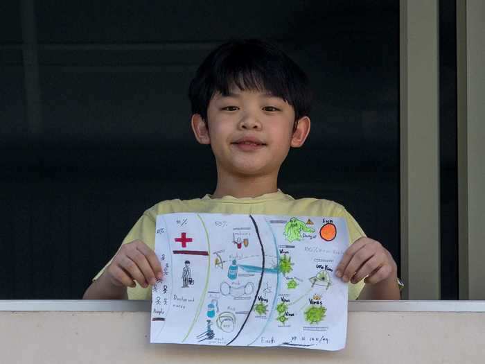 Other children have been using their drawings to directly respond to the virus. In Thailand, 10-year old Nipoon Kitkrailard drew medical workers and protective gear holding back the coronavirus monster as it tries to invade the world.