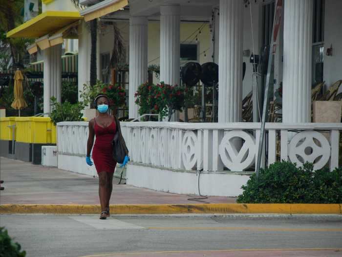 The few pedestrians in the area all wore masks, which is required by the city, and some even wore gloves.