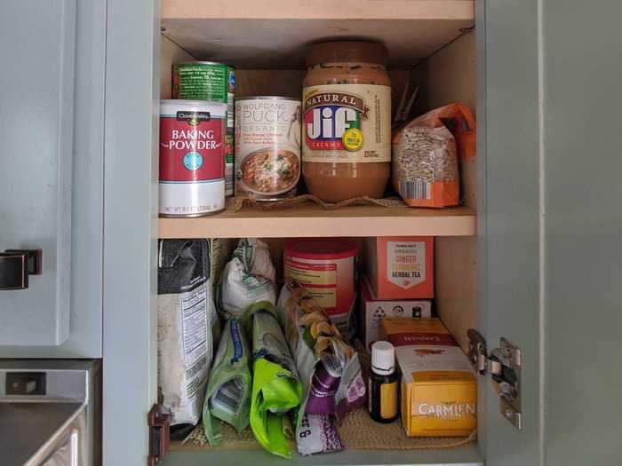 They only have one real cupboard to store dry goods, so they took anything they could squeeze air out of to make space. "It doesn