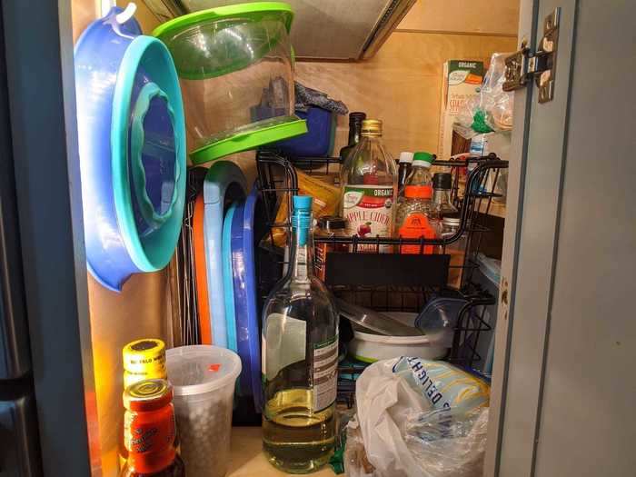 "The lower cabinets have seen a couple extra items these days such as a sack of potatoes, sauce, tapioca pearls for bubble tea, and some extra wine of course," they said. This led them to add more organizers and baskets.