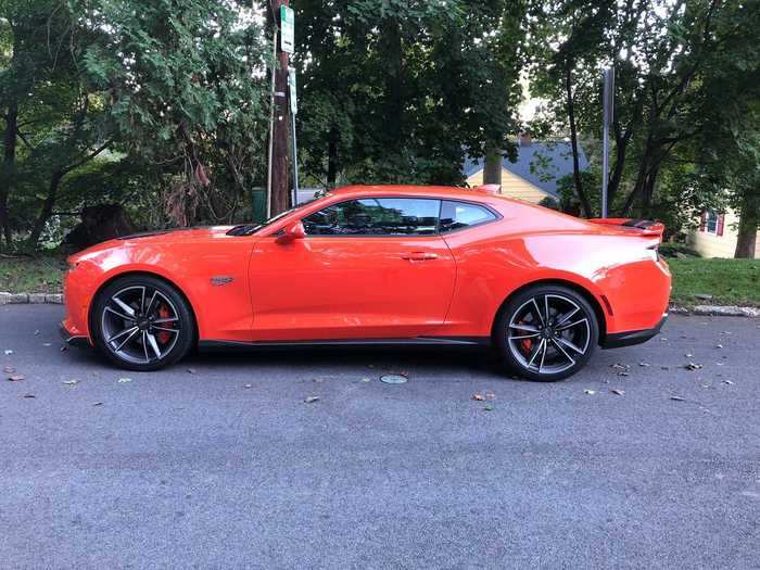 With its high beltline, bold rear haunches, low-slung stance, and overall spirit of throwback, muscle-car aggression — not to mention the orange paint job — the Camaro SS makes a statement, anywhere and everywhere.