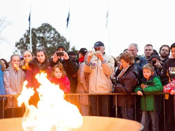 In previous years, thousands of people gather around the eternal flame outside of the Shrine.