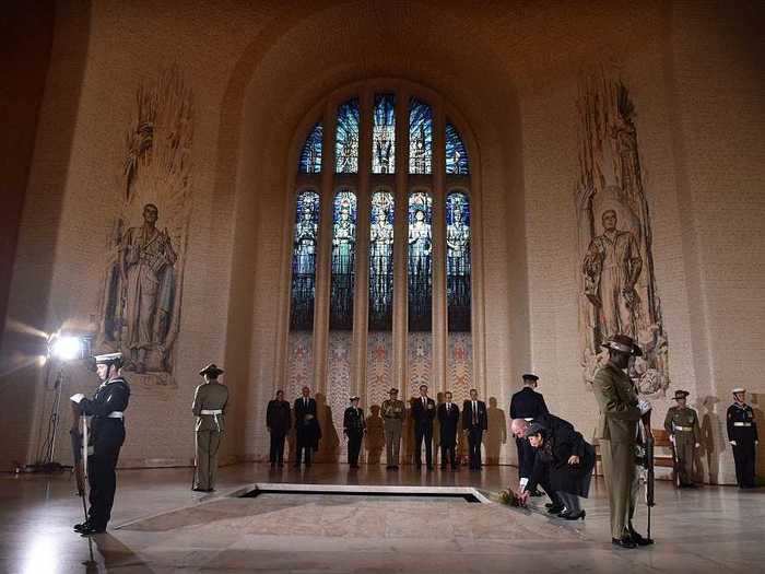 In previous years, officials laid wreaths at the Tomb of the Unknown Soldier after the national service at the memorial as several guards look on.