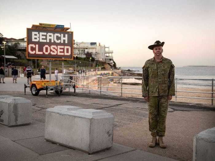 In North Bondi, a popular beach in Sydney, military cadets stood guard to ensure social distancing rules were enforced.