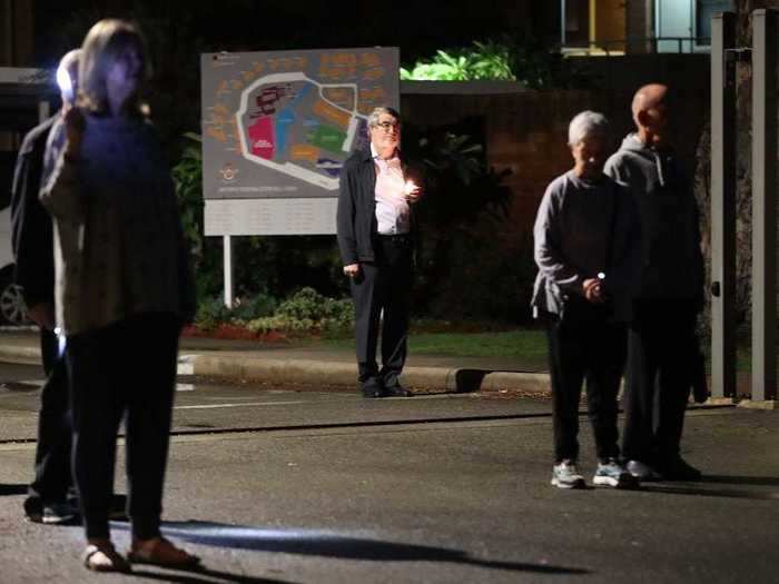 Veterans and civilians alike stood in their driveways for the dawn service.