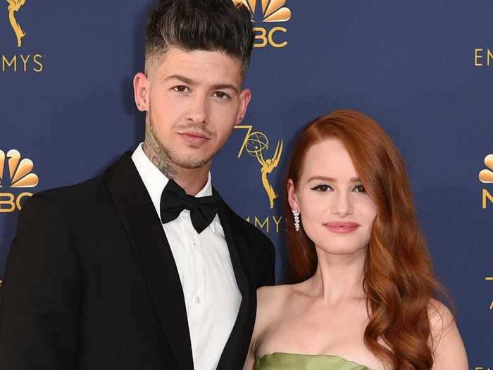 Travis Mills and "Riverdale" star Madelaine Petsch split after three years together.