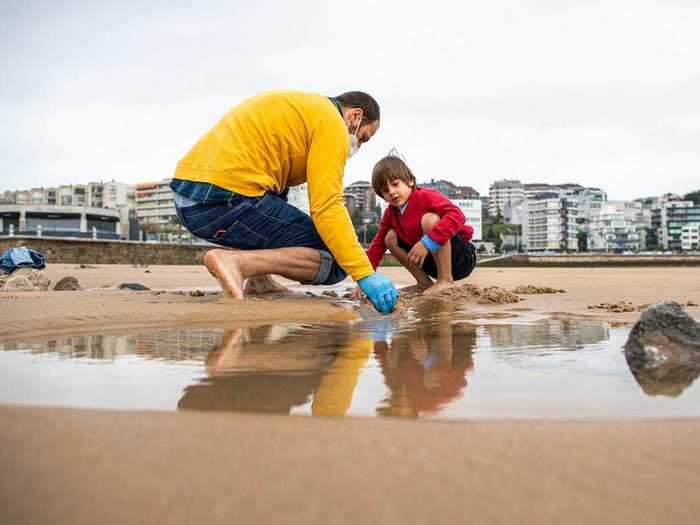 Families explore beaches.