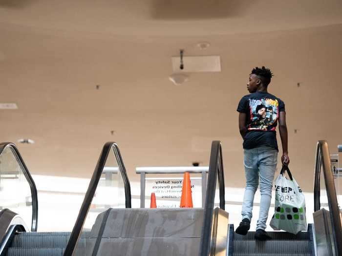 Another mask-less shopper at Columbia Place Mall.