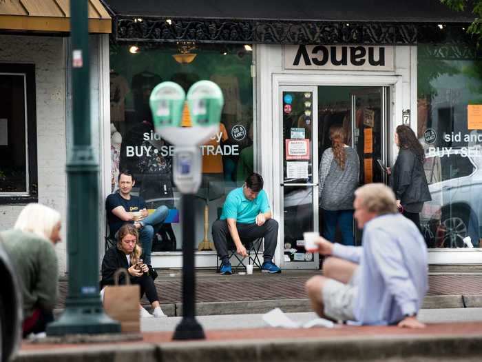 Elsewhere, customers started to flood back into eateries and cafes, like this group sitting outside of a coffee shop in Columbia, South Carolina.