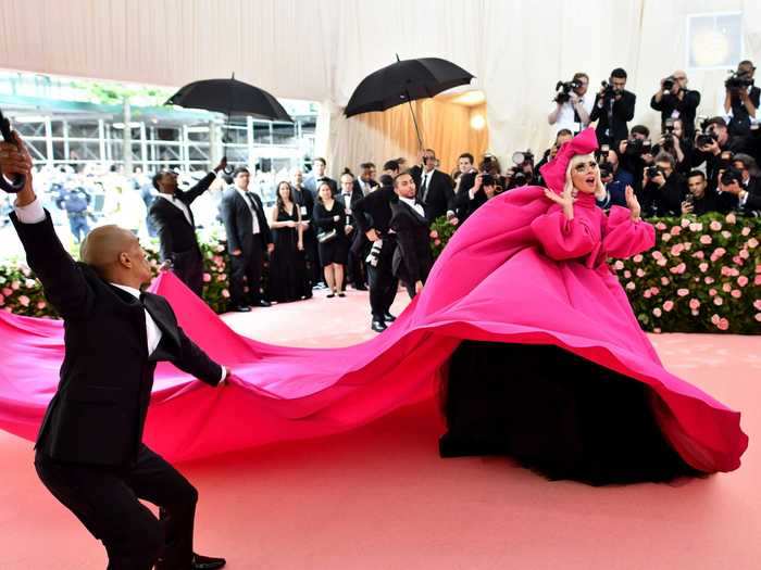 Lady Gaga arrived at the 2019 Met Gala in a sweeping pink gown by Brandon Maxwell.