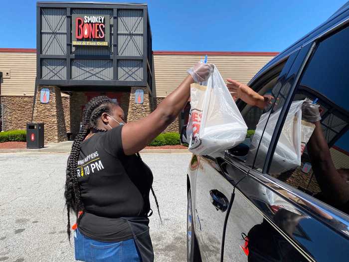 Even though dining rooms are opening up, curbside pickup, takeout, and delivery will still be a large portion of Smokey Bones