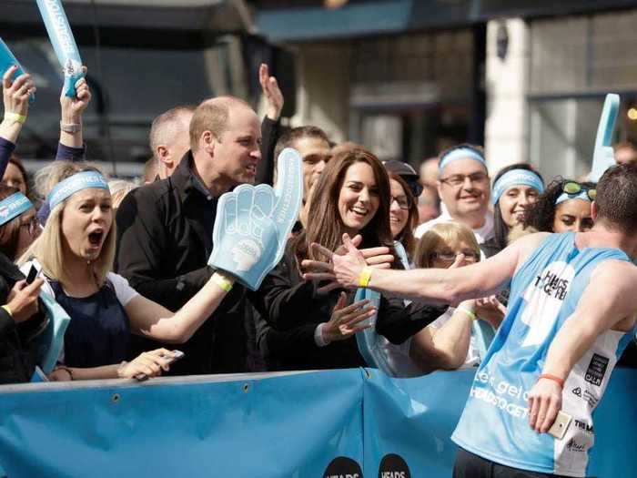 They high-five marathon runners.