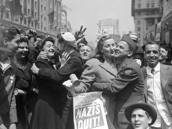 News of victory spread fast as newspapers ran big headlines like "Nazis give up" and "Nazis quit."
