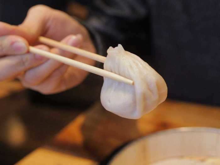 Soup dumplings can be messy, so you should suck the soup out of them before eating.