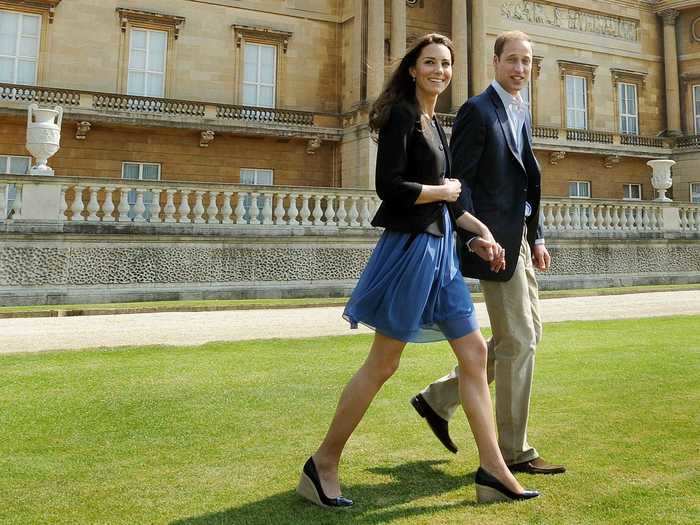 The newlyweds held hands on their way to their honeymoon.