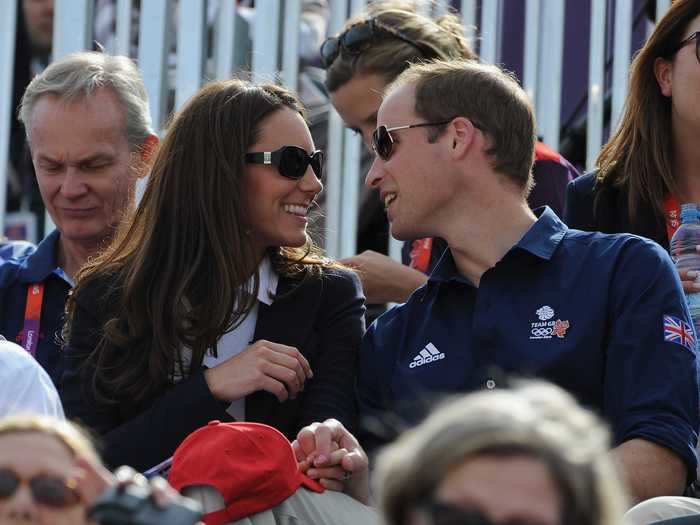 As spectators at the 2012 Olympics, Prince William and Middleton held hands in the stadium seats.