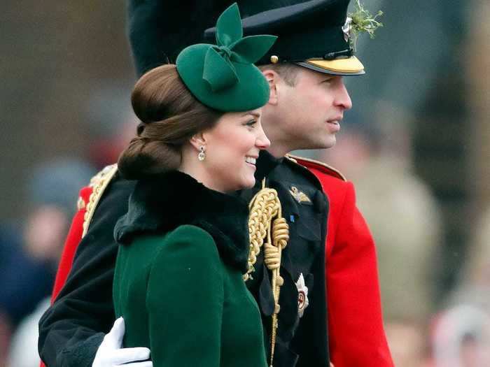 Prince William seems to often place his hand on Middleton