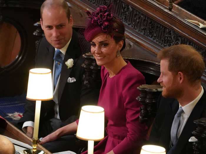 Middleton was photographed putting her hand on Prince William