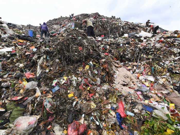 Locals refer to the massive heap of garbage as "the mountain," and since it opened over 30 years ago, numerous villages have sprung up around its base. Officials say around 6,000 people receive livelihood from the landfill, but locals estimate that number to be far higher, at 20,000.