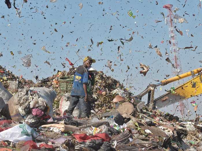 Trash scavengers, known as "pemulung" in Indonesian, use the massive dump of garbage as an opportunity to find scraps that can be sold and recycled for cash.