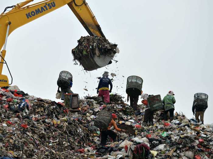 On a typical day, hundreds of scavengers climb the mountain in search of metal, cardboard, plastic, wood, or other recyclables. Even animal bones are a welcome find, as they can be sold to produce jewelry and other goods.