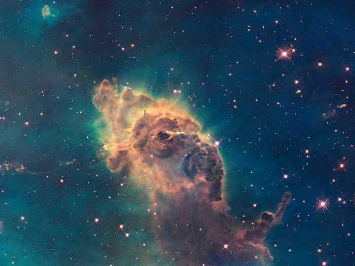 This pillar residing in the Carina Nebula is located 7,500 light-years away from Earth.